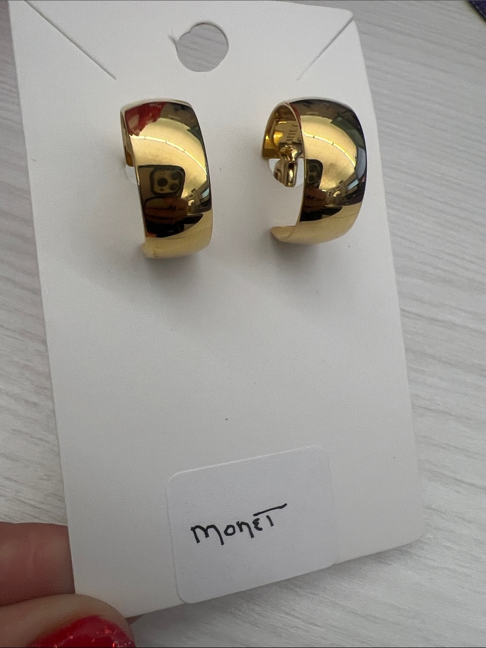 Monet Polished Gold Curved Huggie Earrings